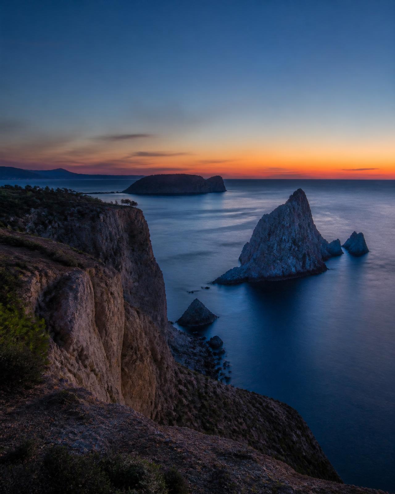 Coastal cliff viewpoint at blue hour